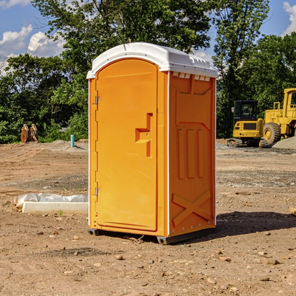 how often are the portable restrooms cleaned and serviced during a rental period in Newberry